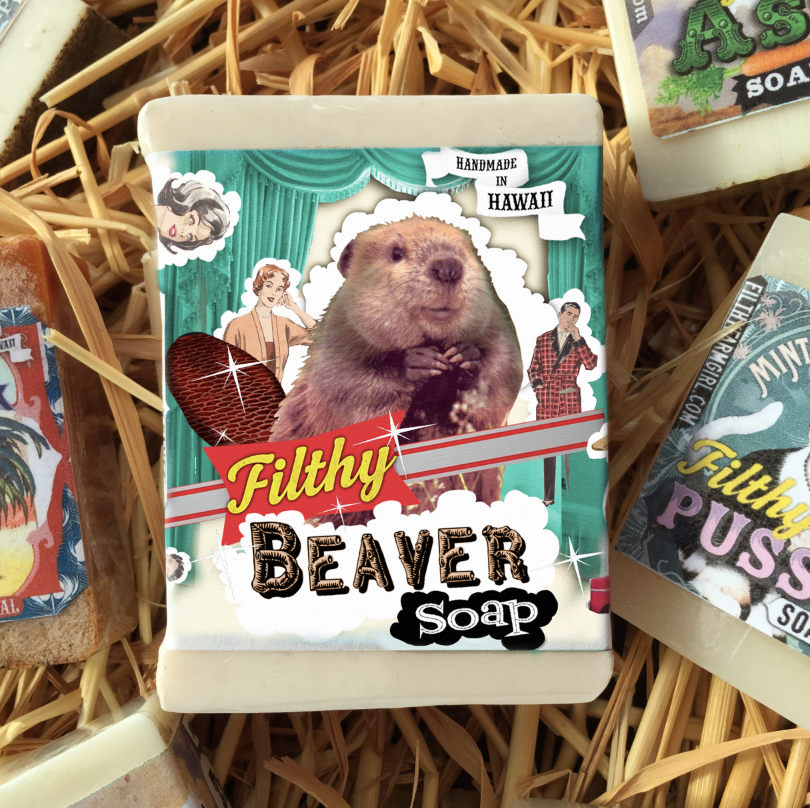 Soap packaging with a beaver illustration and text on a straw background