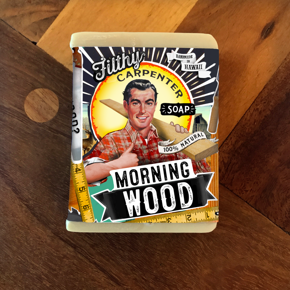 Soap bar with 'Morning Wood' text and vintage-style packaging on a wooden surface