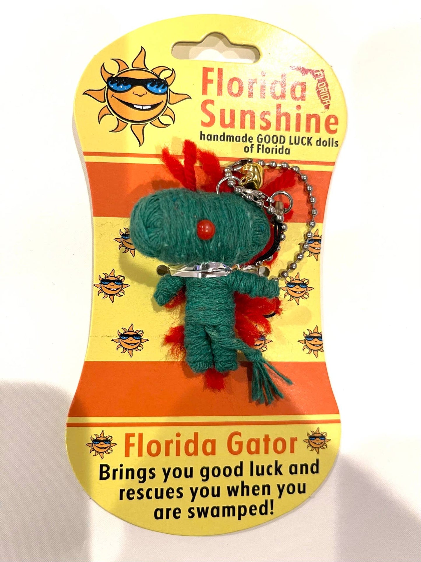 Florida Sunshine handmade good luck doll on a yellow card with text