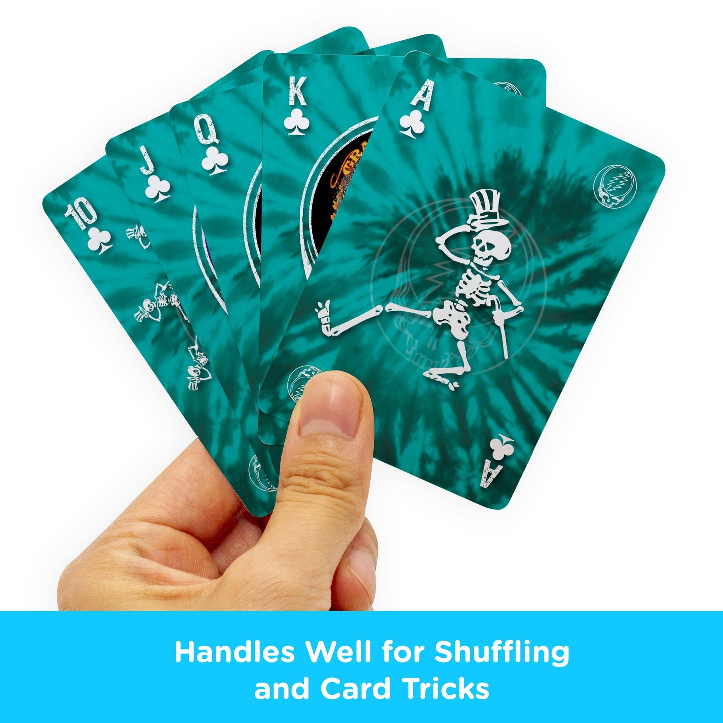 Hand holding a set of teal playing cards with skeleton design, text 'Handles Well for Shuffling and Card Tricks' at the bottom.