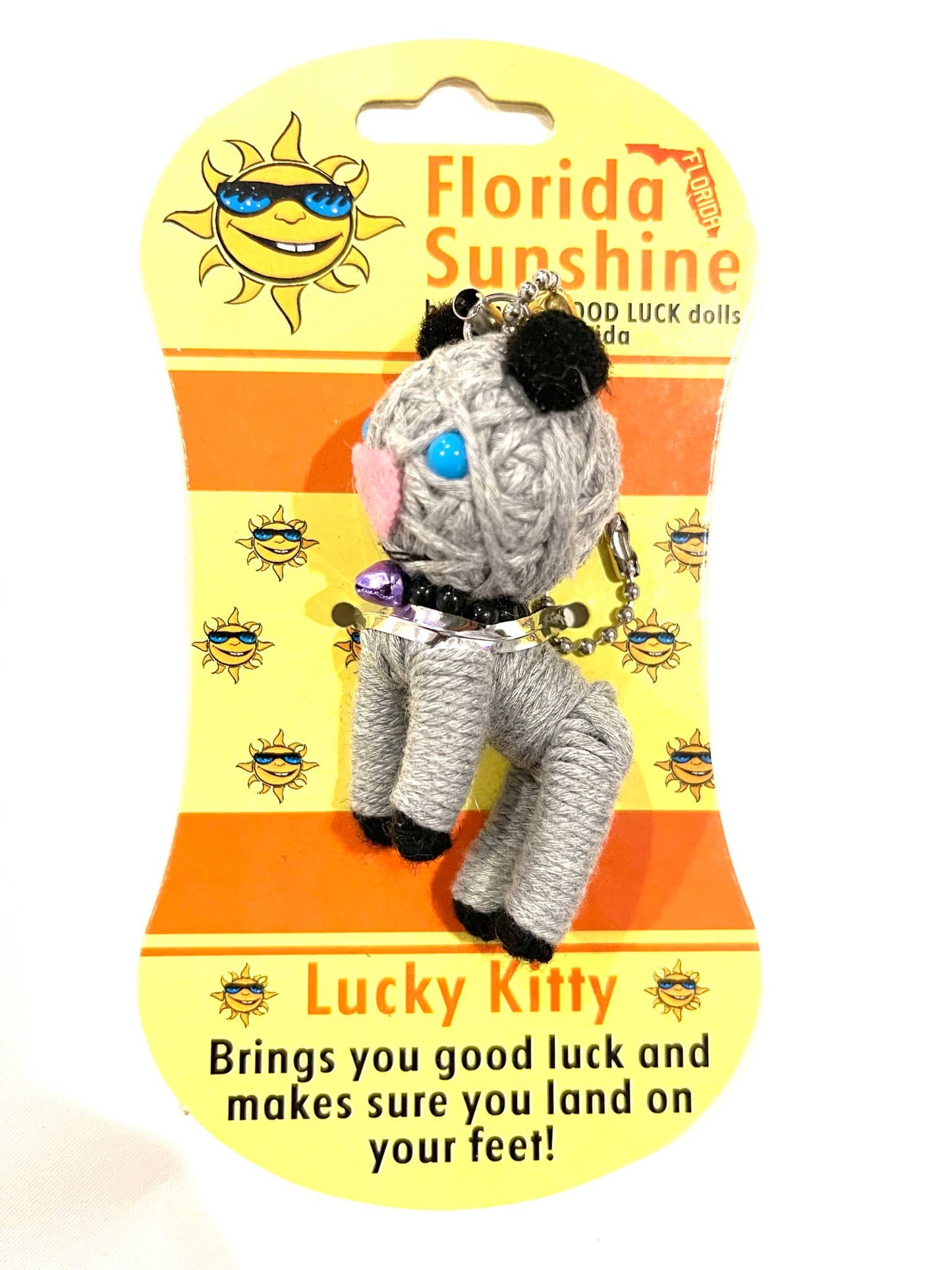 Plush voodoo toy cat with keychain on a Florida Sunshine packaging