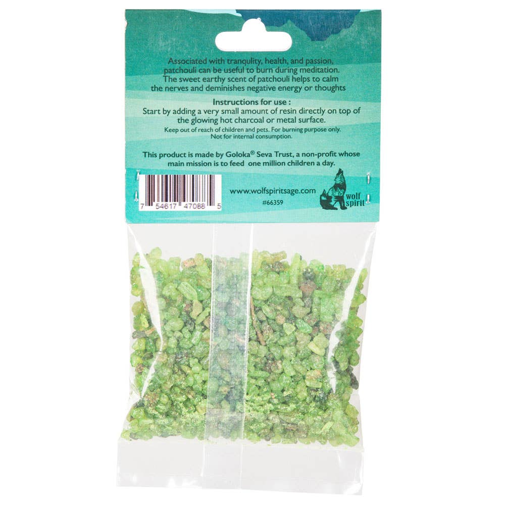 Packaged green herbs with a teal label on a white background