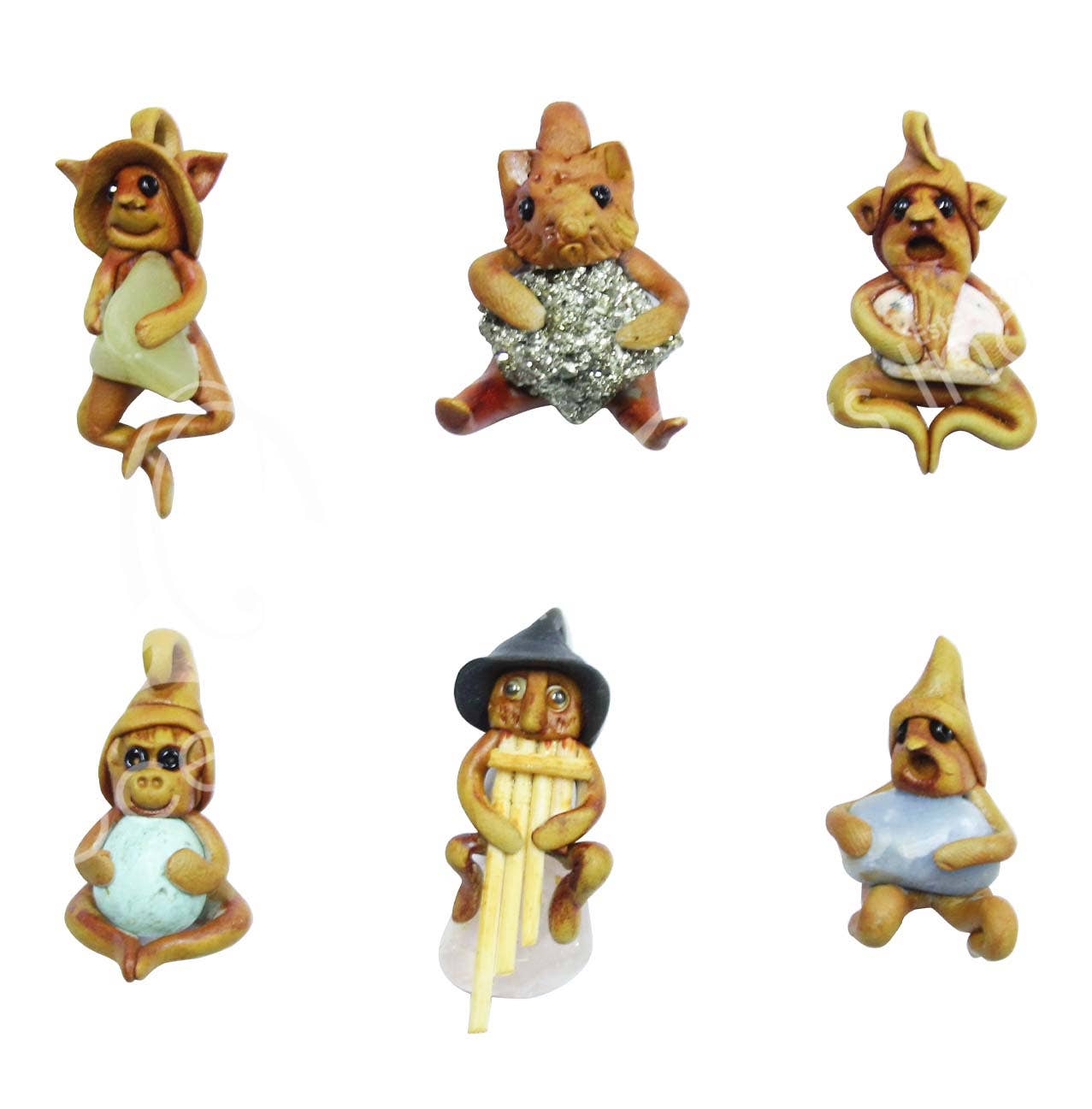 Set of six small figurines of animals in various poses on a white background