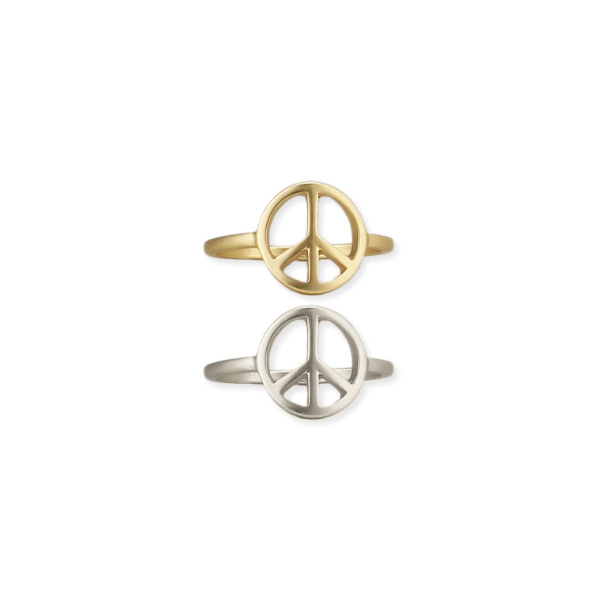 Two peace symbol rings, one gold and one silver, on a white background.