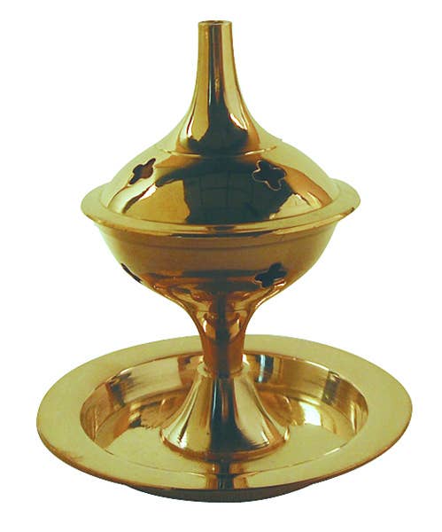 Gold-colored incense burner on a white background