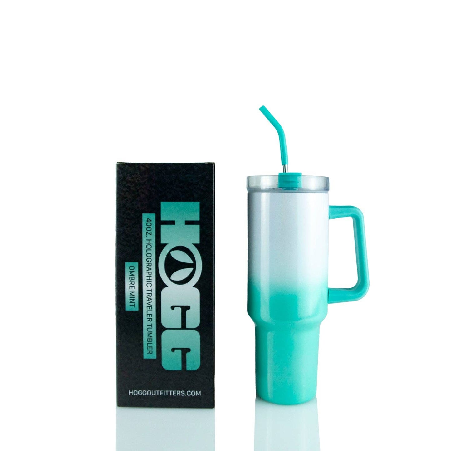 Turquoise and white tumbler with handle and straw next to a black box labeled 'HOGG'.
