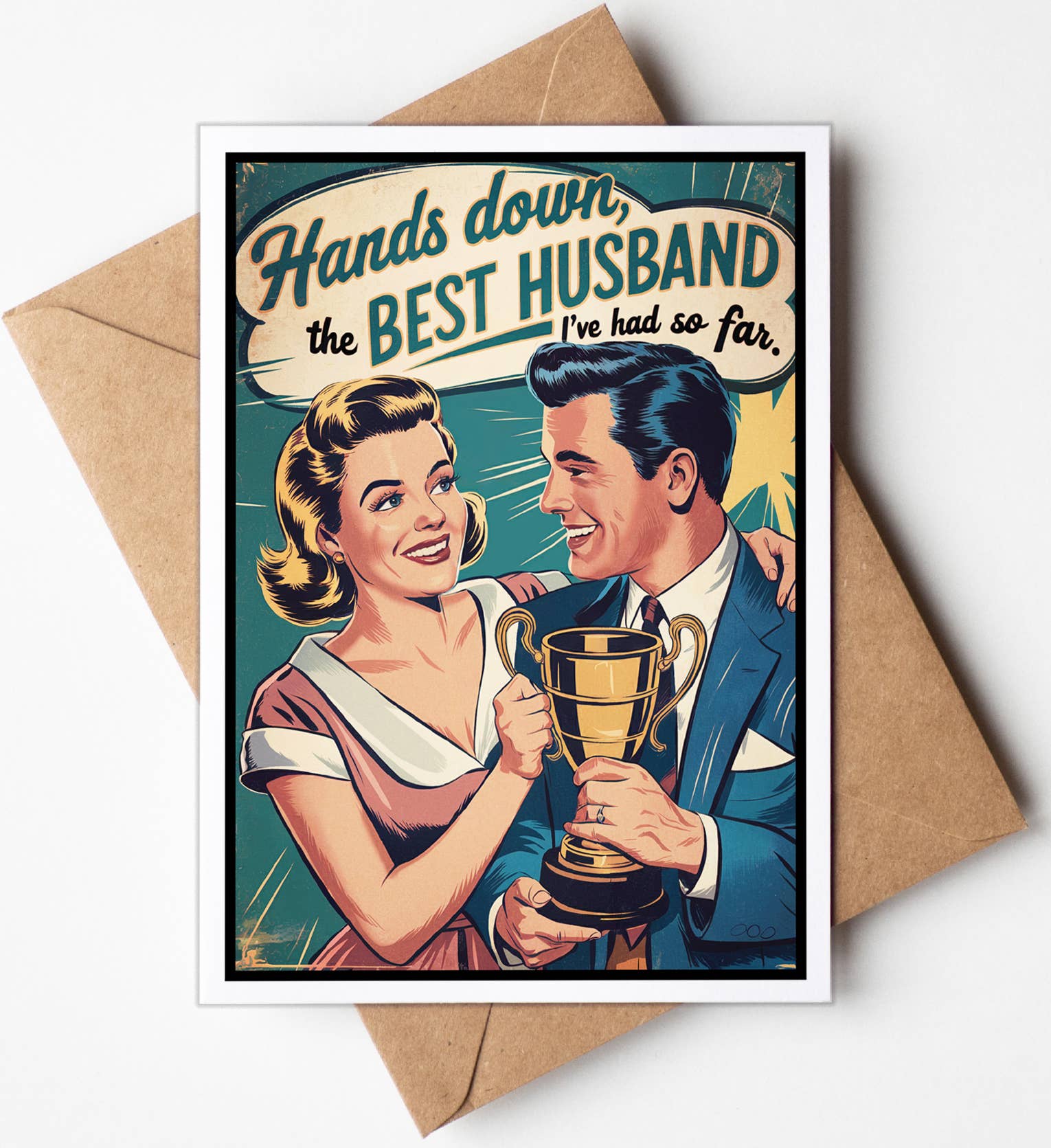 Greeting card with a vintage-style illustration of a man and woman holding a trophy, with text 'Hands down, the best husband I've had so far'.