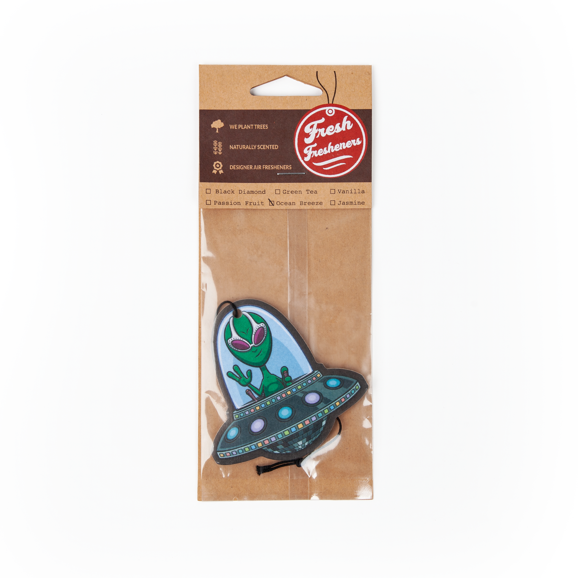 Packaged air freshener with alien design on a white background