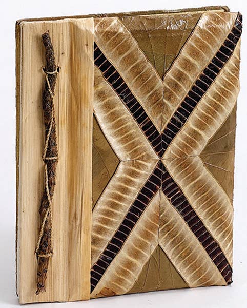 Wooden book with decorative cover and natural wood texture