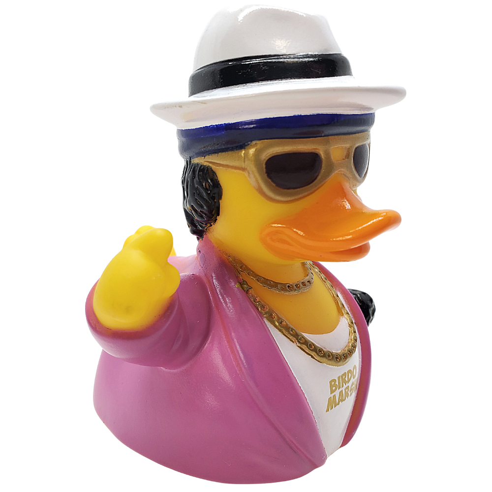 Decorative rubber duck wearing sunglasses, a hat, and a pink outfit on a white background