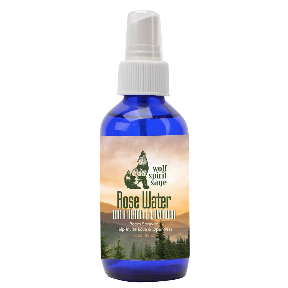 Blue spray bottle labeled 'Wolf Spirit Sage Palo Santo' on a white background