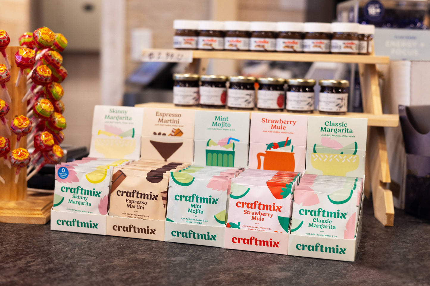 Craftmix product packaging on a counter with jars in the background
