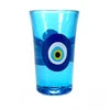 Blue glass with a decorative pattern on a white background