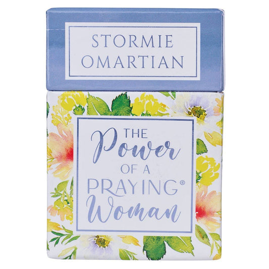 Book titled 'The Power of a Praying Woman' by Stormie Omartian with floral design on cover