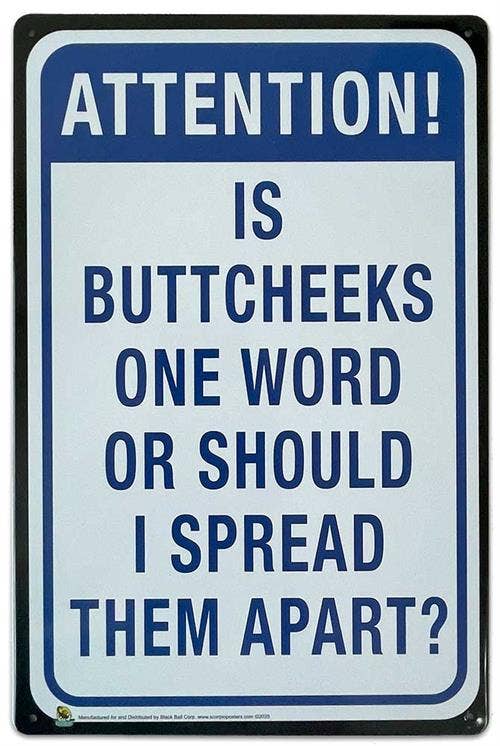 Metal sign with humorous text about body parts on a blue background