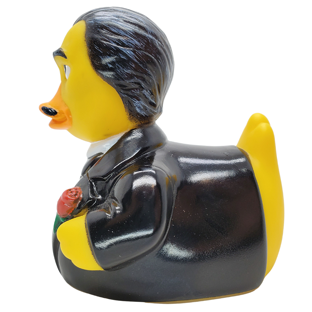 Rubber duck with a formal outfit and flower on a white background