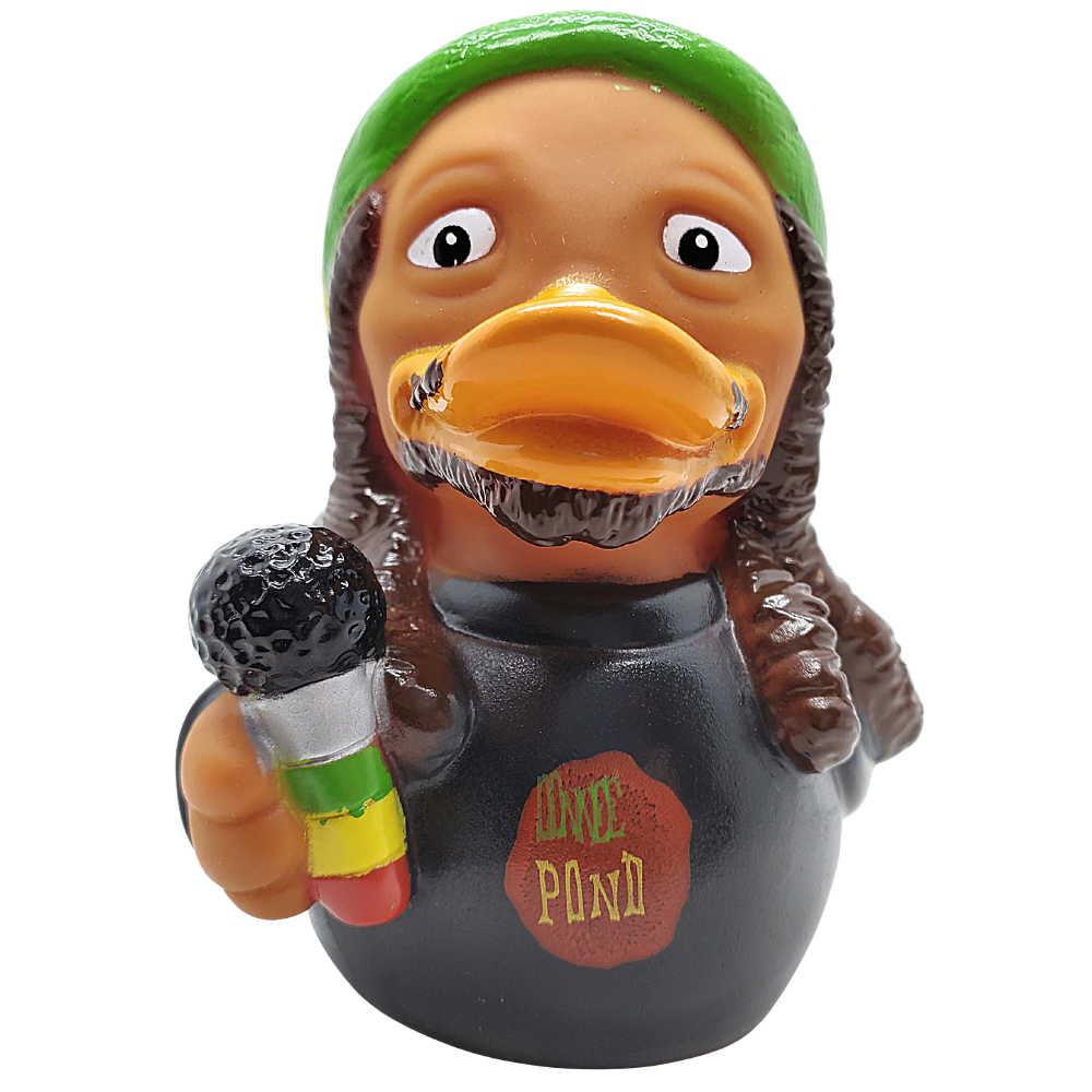 Figurine of a duck with a green hat and microphone, wearing a shirt with text, on a white background.