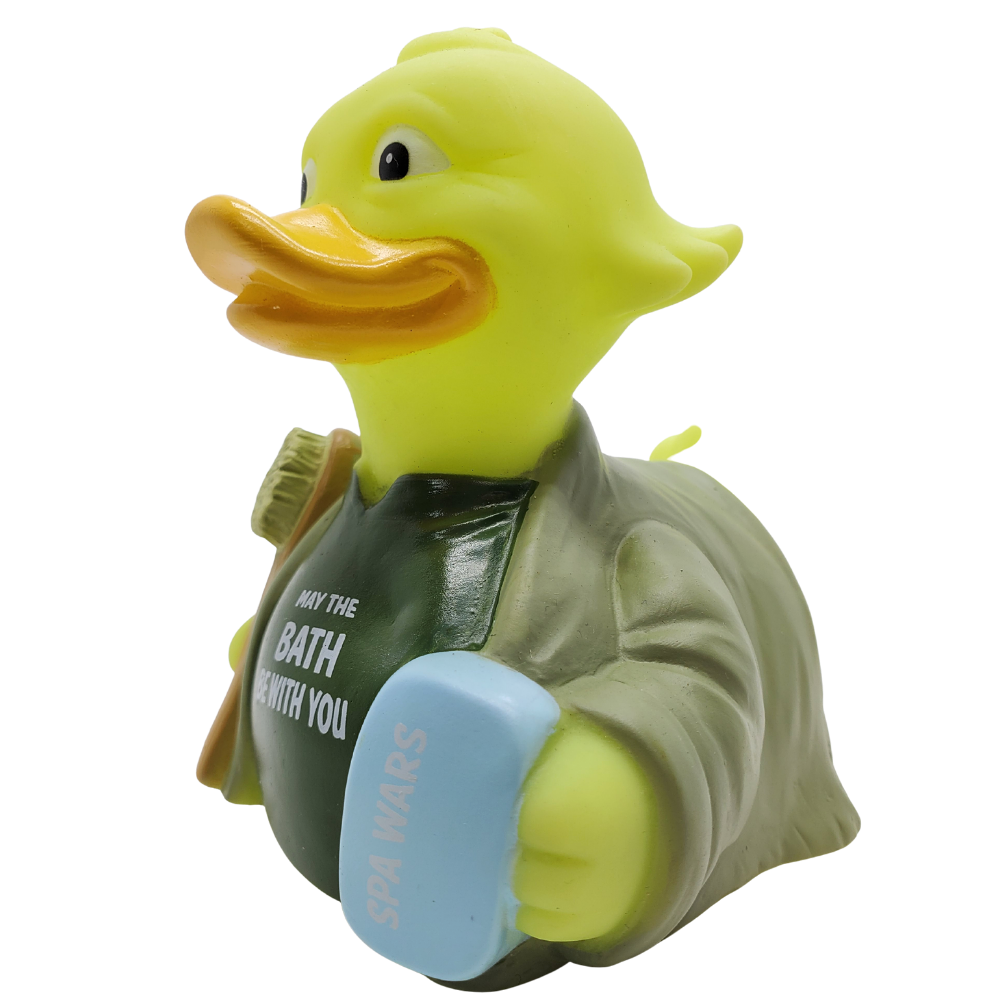 Rubber duck with a backpack and towel on a white background