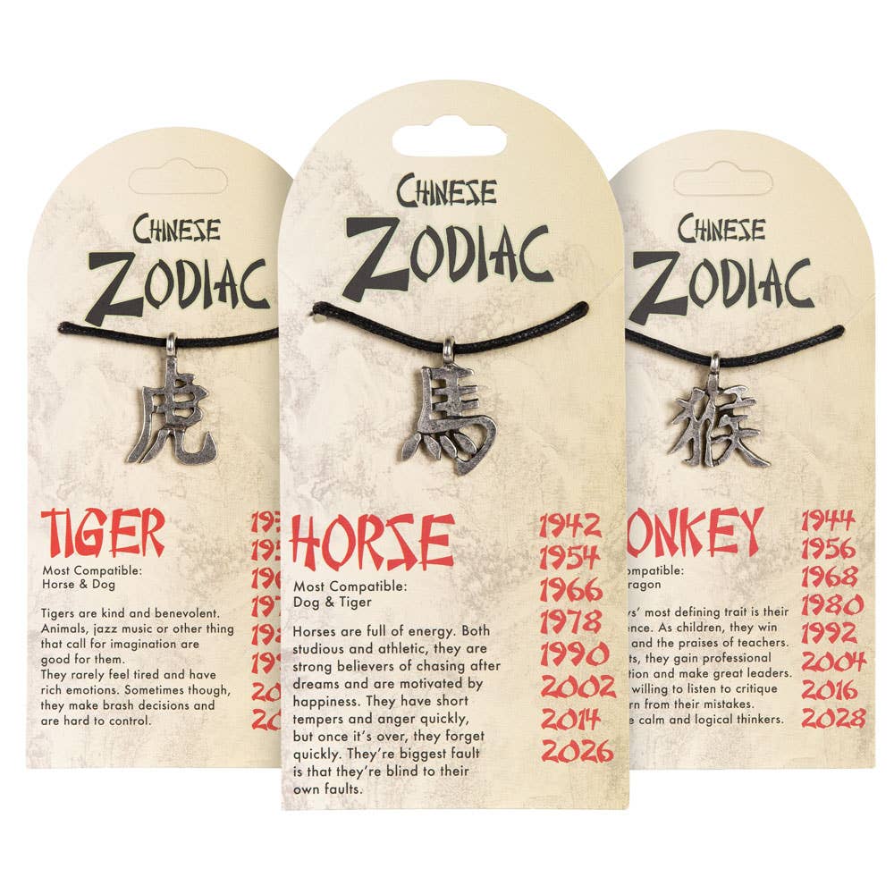 Three Chinese Zodiac necklaces with corresponding compatibility text on beige cards.