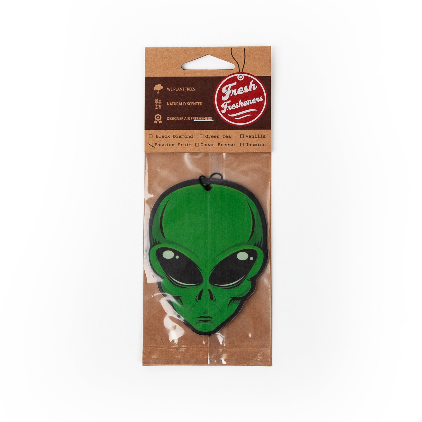 Green alien-shaped air freshener in a brown package with 'Fresh Fresheners' branding.