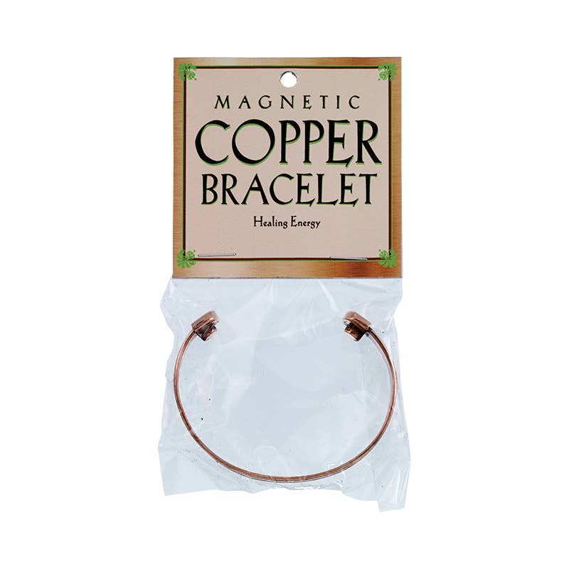Magnetic copper bracelet on a clear plastic bag with a label indicating 'Healing Energy'.