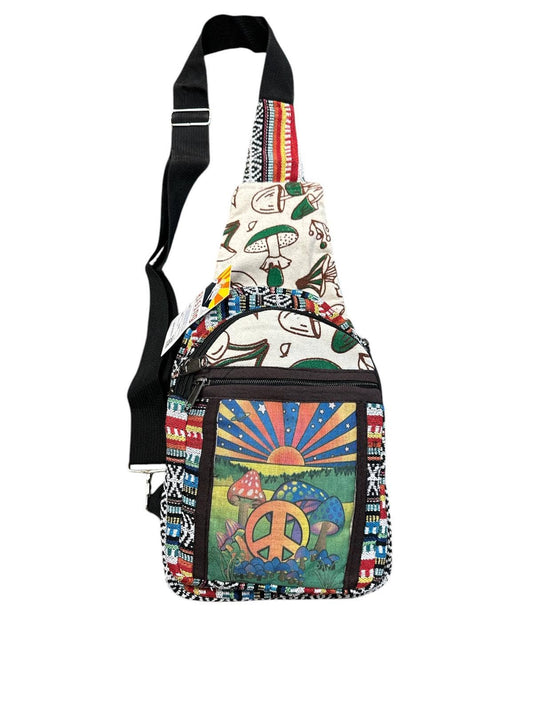 Colorful crossbody bag with peace symbol and mushroom design on a white background