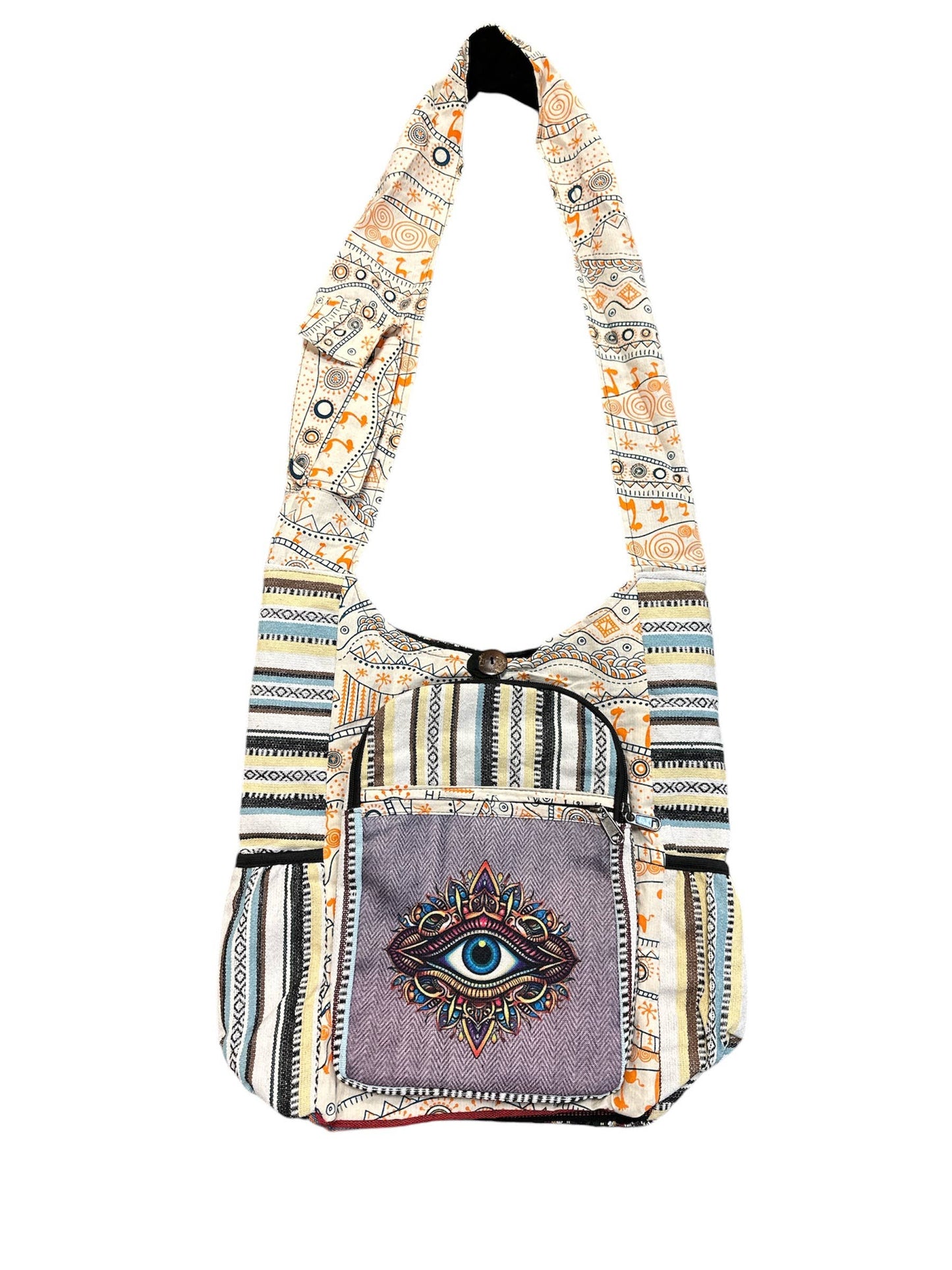Patterned shoulder bag with an eye design on a white background