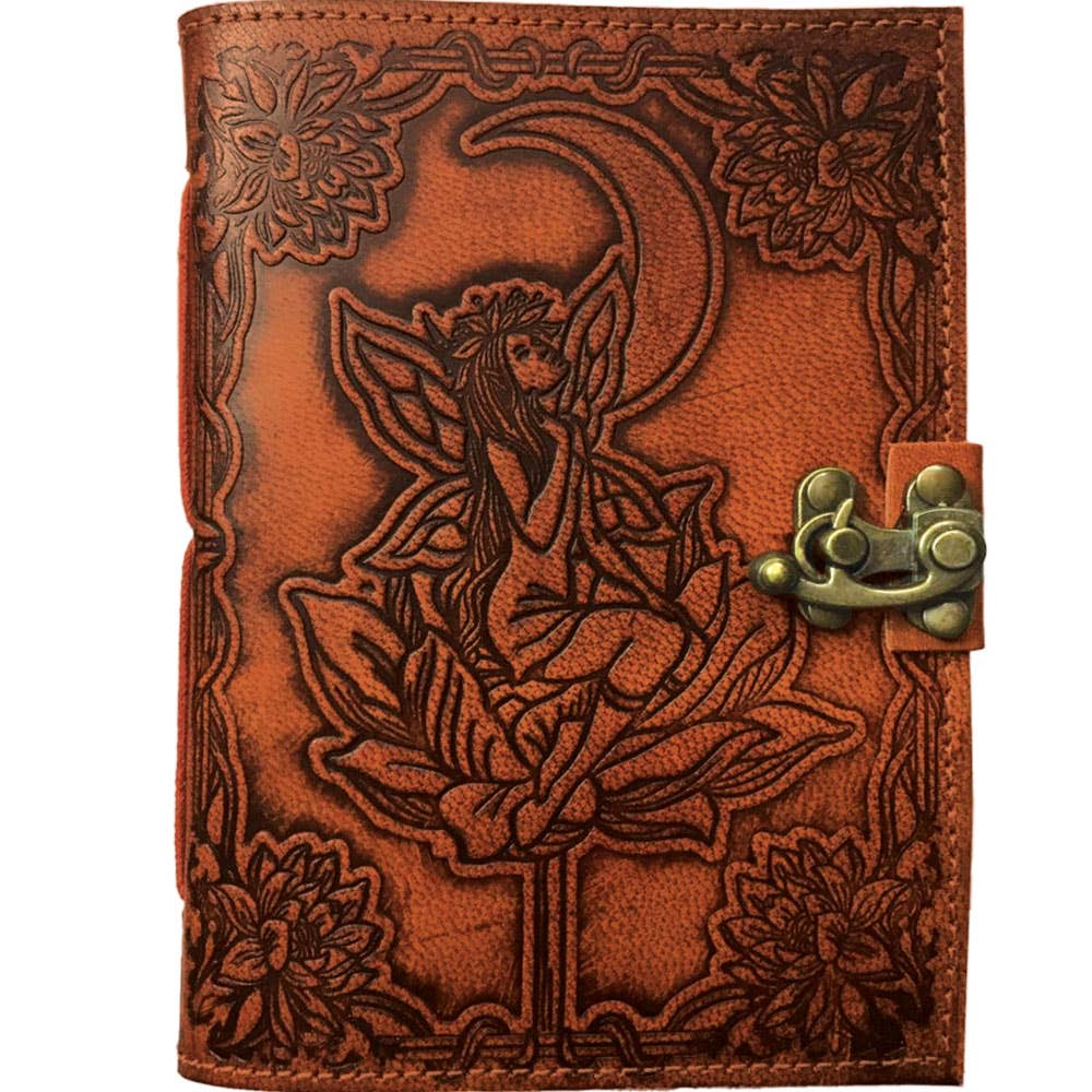 Brown leather journal with embossed fairy design and floral elements on a white background