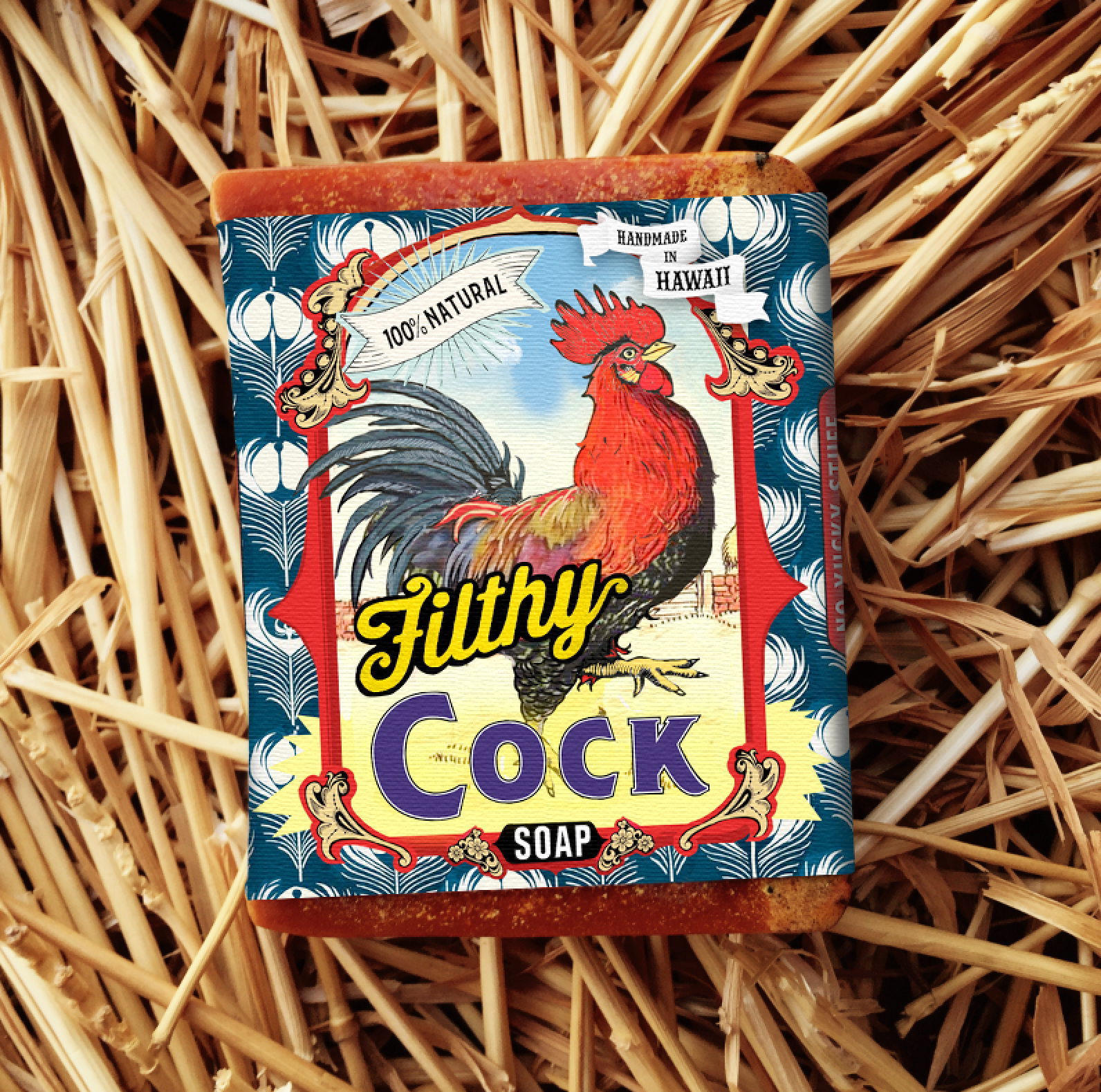 Soap bar with a colorful label featuring a rooster on a bed of straw.