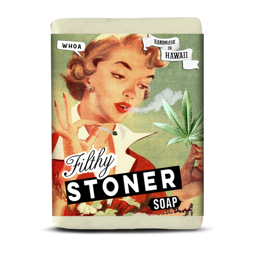 Soap bar with a retro-style packaging featuring a woman smoking a cigarette and holding a cannabis leaf, labeled 'Filthy Stoner Soap'.