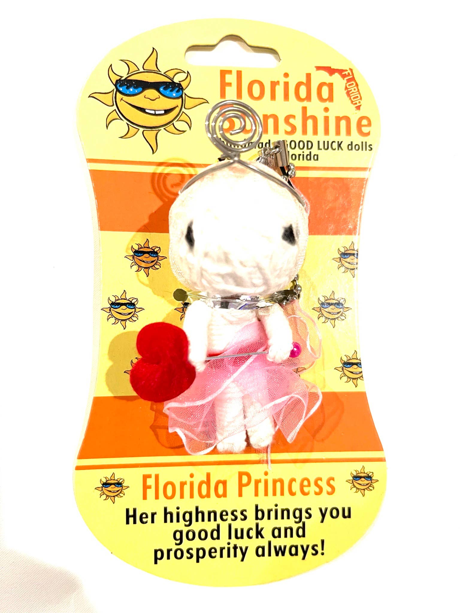 Keychain voodoo doll with 'Florida Princess' design on a 'Florida Sunshine' branded card.