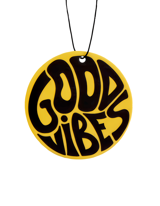 Round yellow and black 'Good Vibes' pendant on a white background