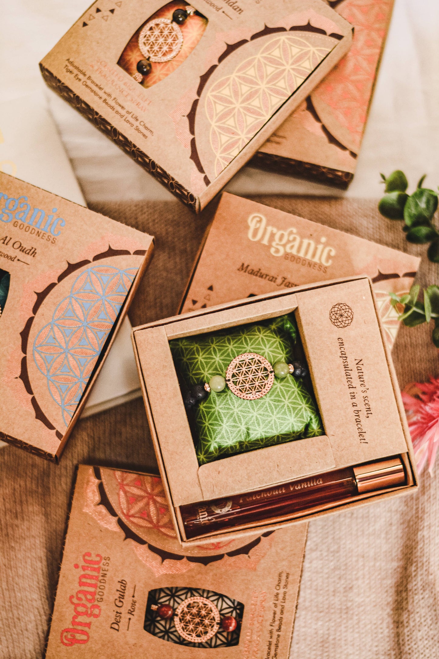 Organic makeup products with brown packaging on a wooden surface