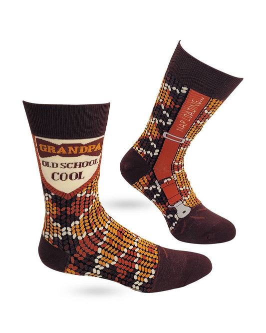Colorful socks with 'Grandpa Old School Cool' text and suspenders design on a white background