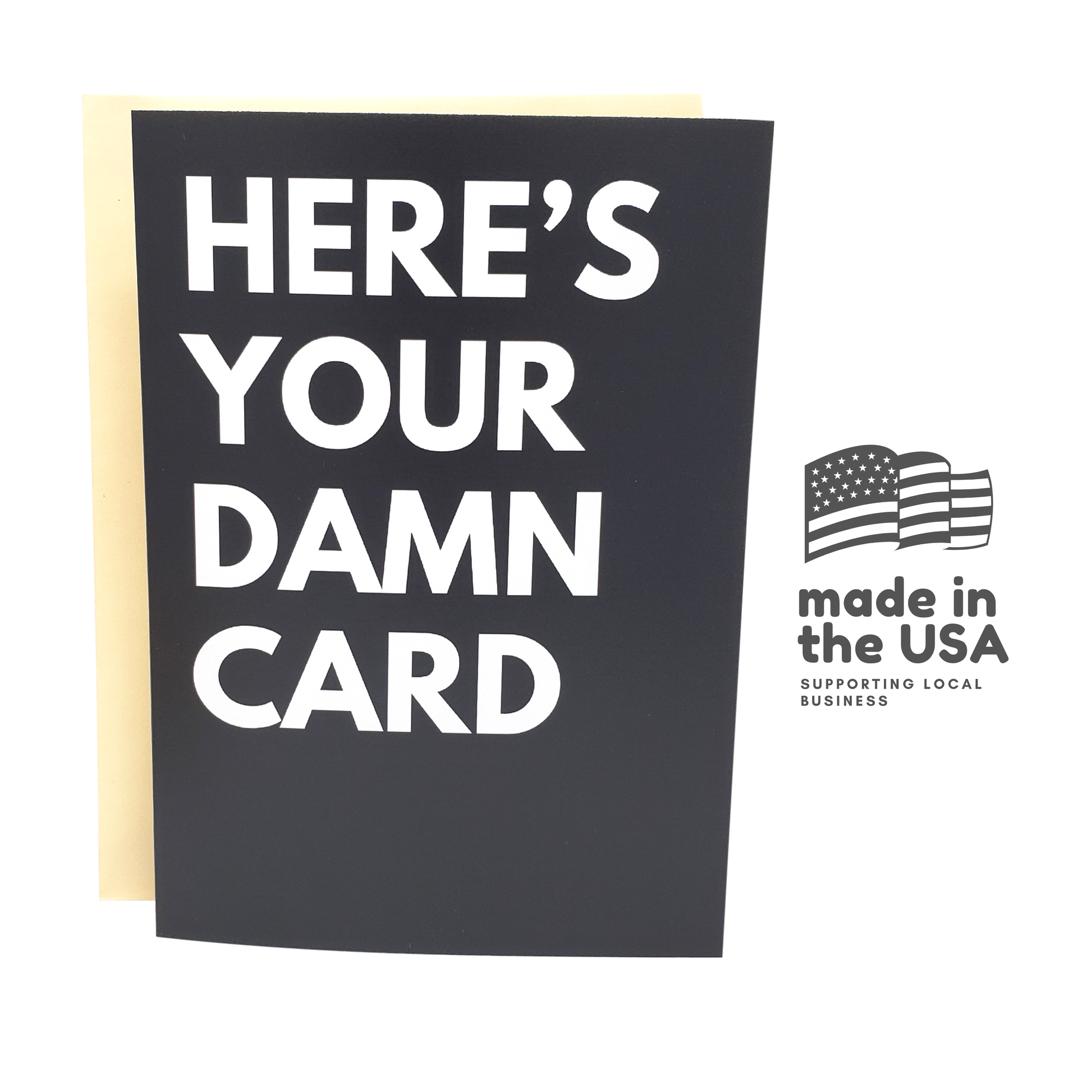 Black card with white text 'HERE'S YOUR DAMN CARD' and 'made in the USA' logo on a white background