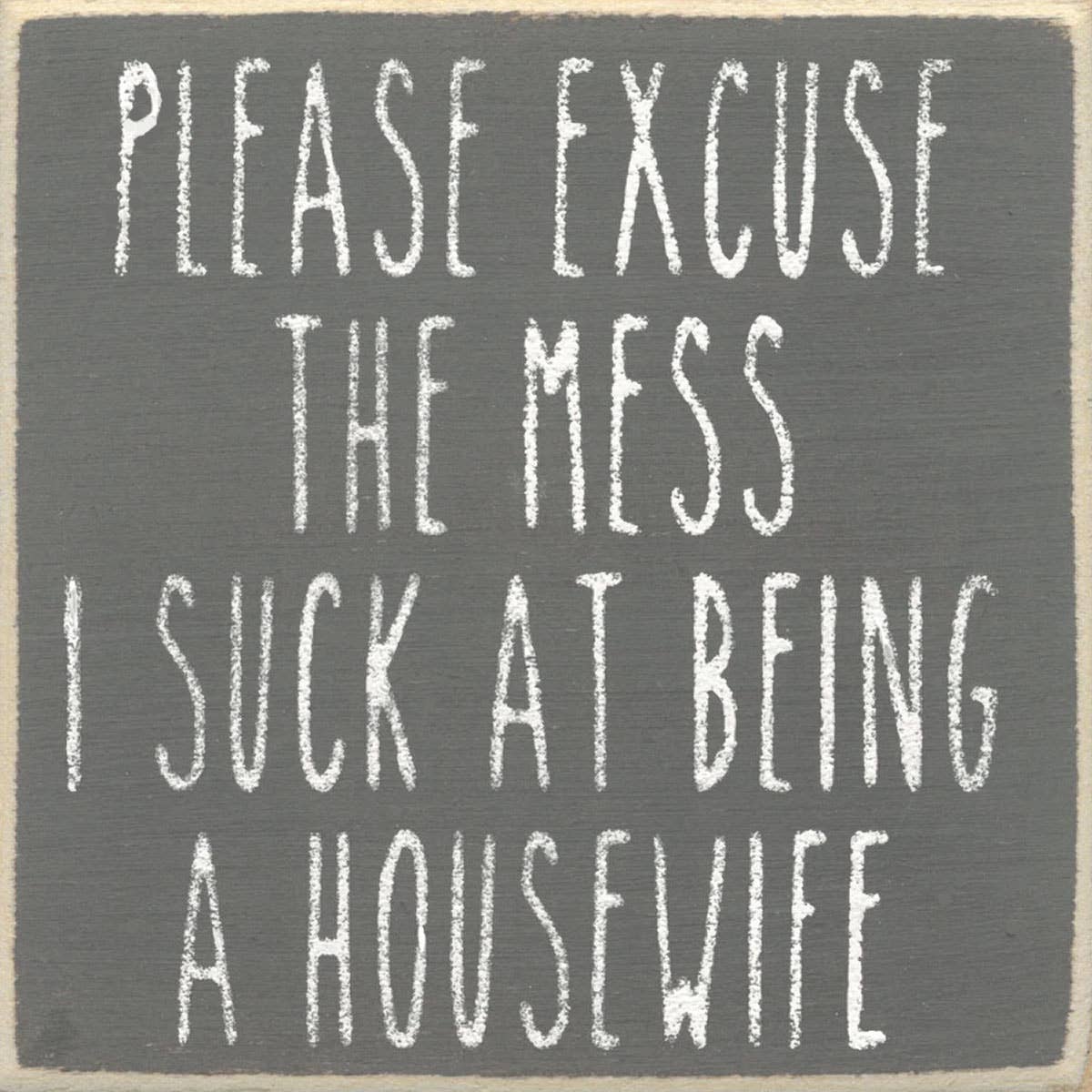 Text sign on a gray background with white text.