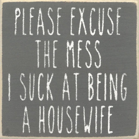 Text sign on a gray background with white text.