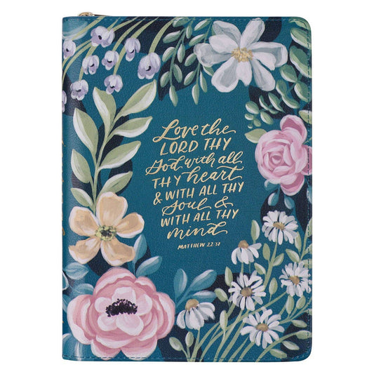 Floral notebook with inspirational quote on a blue background