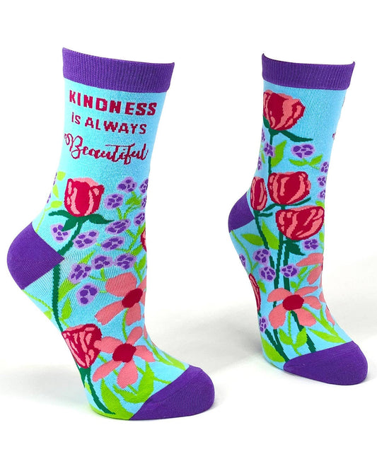 Floral socks with 'Kindness is Always Beautiful' text on a white background