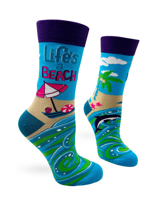 Colorful socks with beach-themed design on a white background