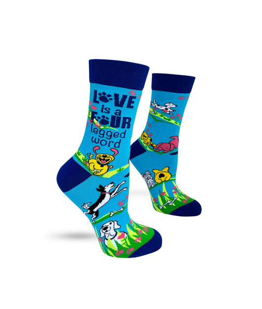 Colorful socks with dog illustrations and text on a white background