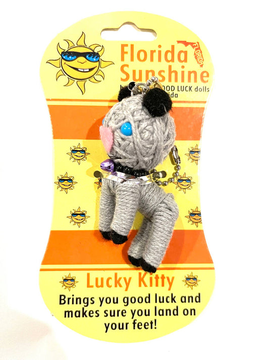 Plush voodoo toy cat with keychain on a Florida Sunshine packaging