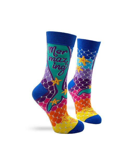 Colorful socks with mermaid scale pattern and 'Mer mazing' text on a white background