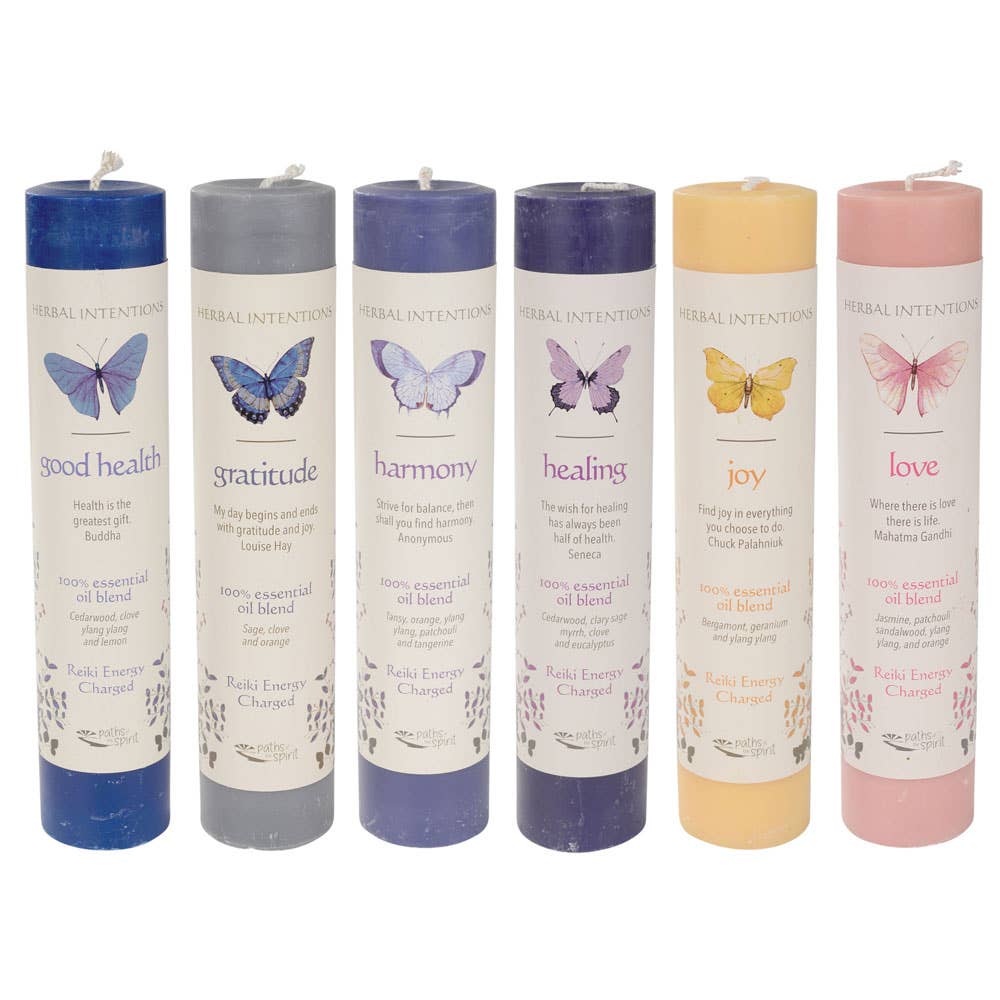 Set of six candles with butterfly illustrations and corresponding words on a white background