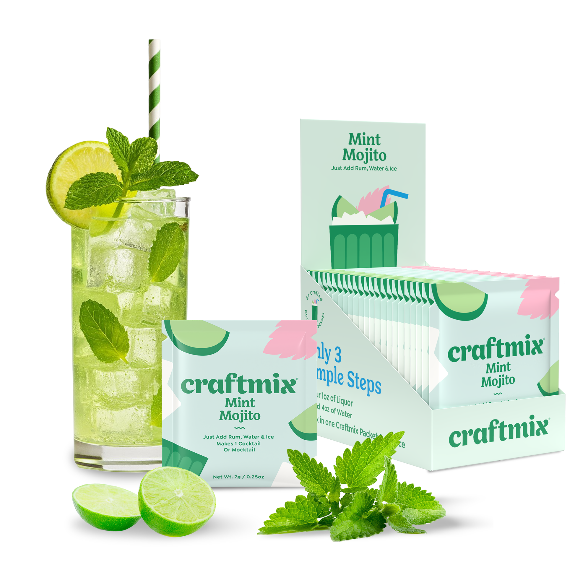 Glass of mint mojito with lime slices and mint leaves, surrounded by craftmix Mint Mojito packets.