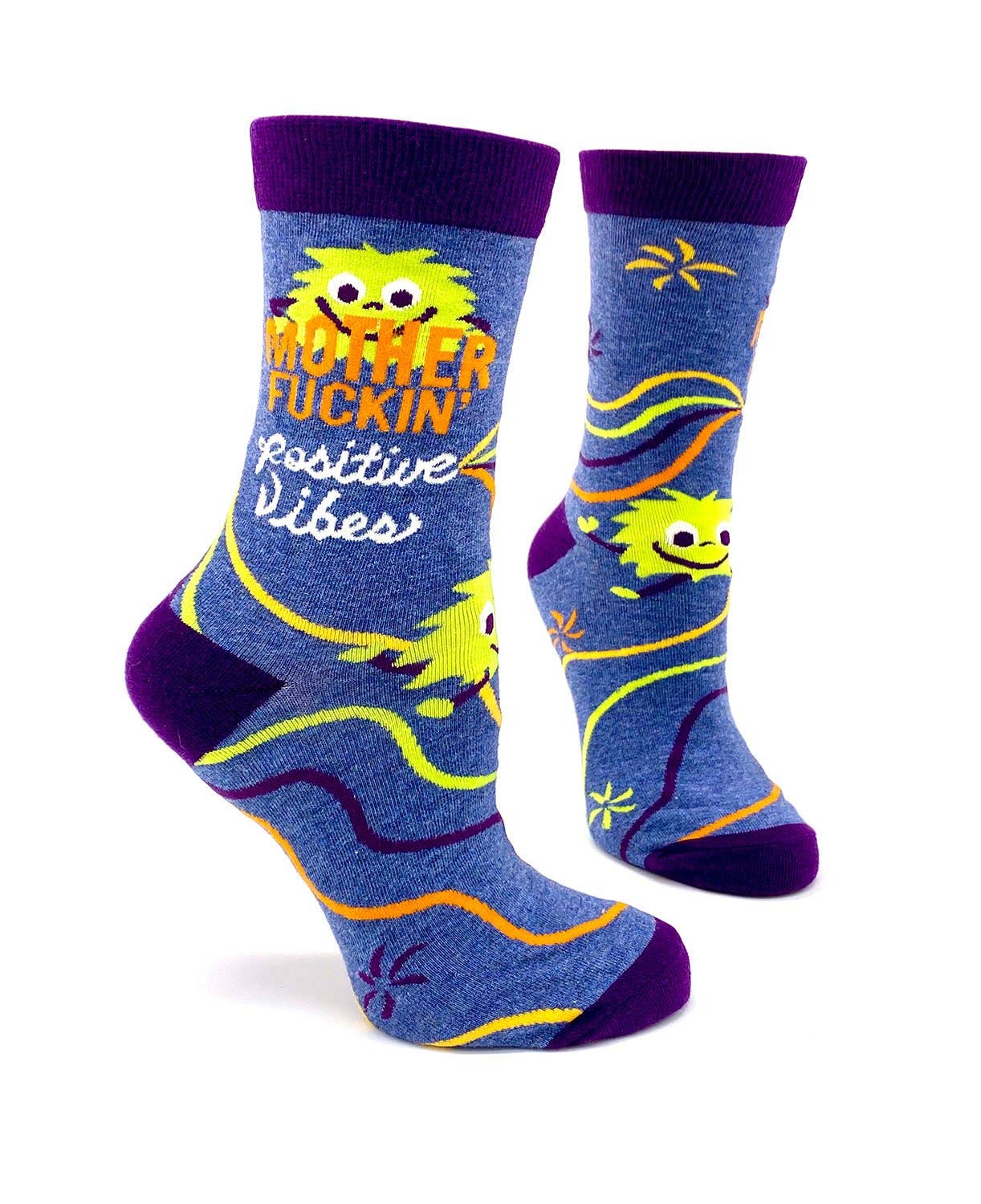 Blue socks with yellow and purple accents featuring a cartoon character and text on a white background