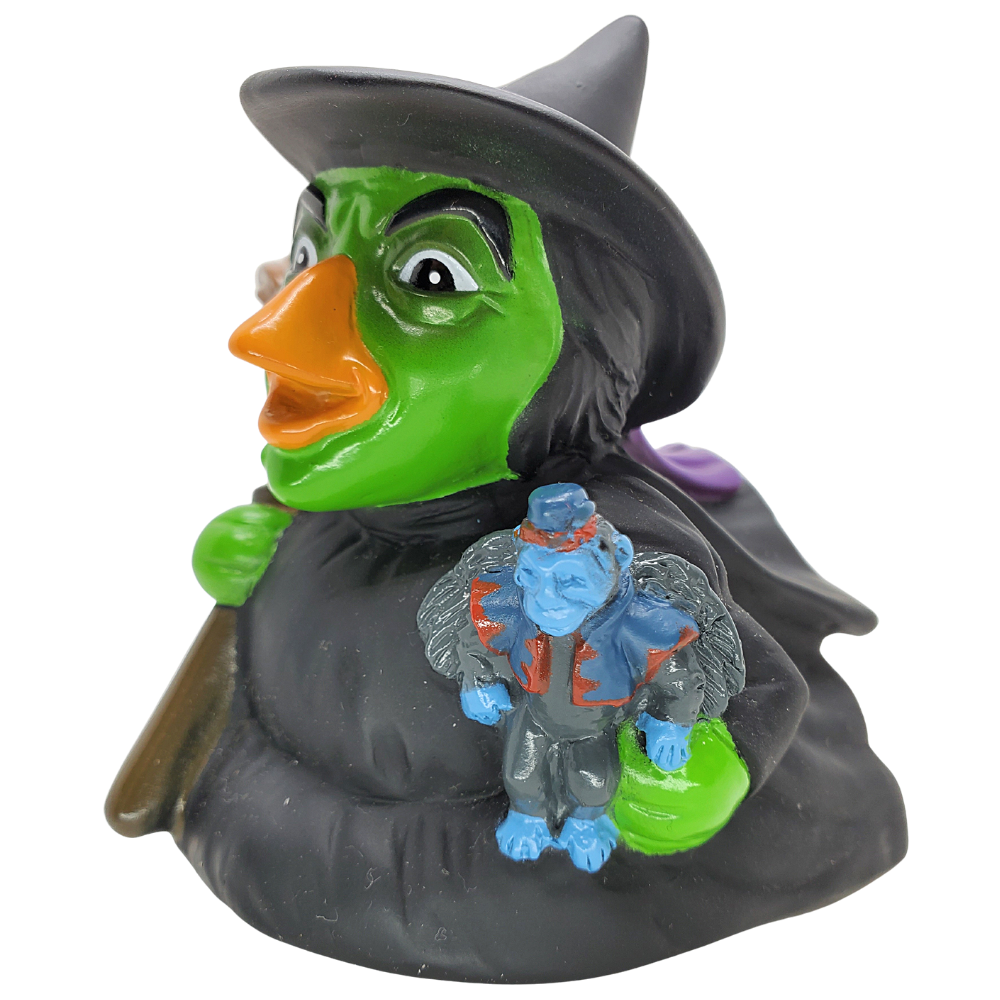 Witch figurine with a small fairy on a white background