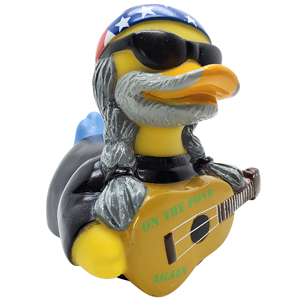 Decorative duck figurine with sunglasses, American flag hat, and ukulele playing 'On the Pund Again' on a white background.