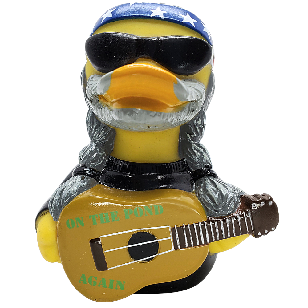 Yellow duck figurine with sunglasses, beard, and guitar, wearing a blue bandana with white stars on a white background.