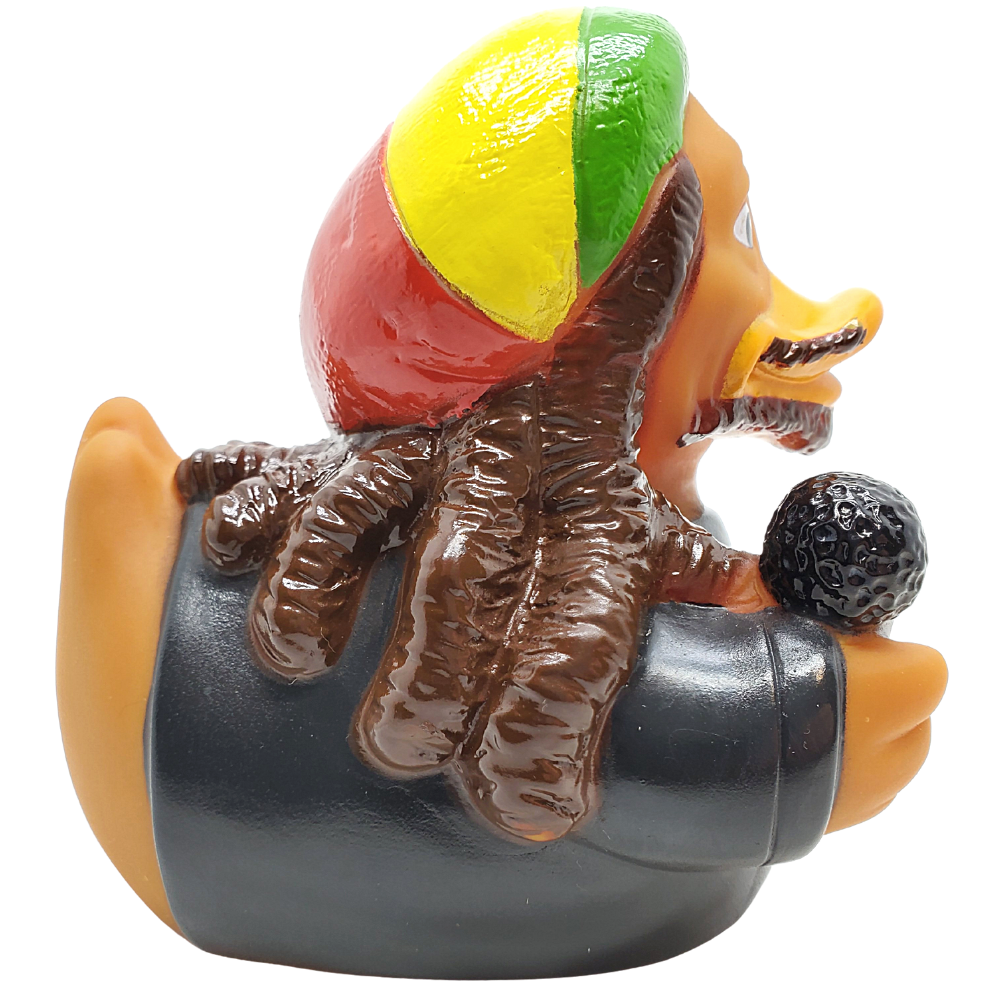 Sculpture of a hand holding a rock with a colorful hat on a white background